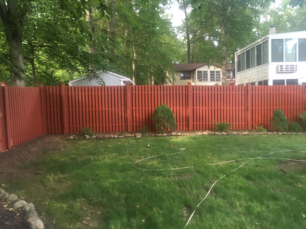 Residential exterior cedar fence painting on druid hill dr in parsippany nj